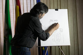 Ángel Idígoras en el espectáculo "Espejismos en su tinta. Magia dibujada". Facultad de Ciencias Económicas y Empresariales. Marzo de 2016