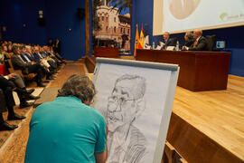 Idígoras dibuja a Pablo Hernández de Cos durante su conferencia en la Facultad de Ciencias Económicas y Empresariales de la Universidad de Málaga. Paraninfo. Octubre de 2022
